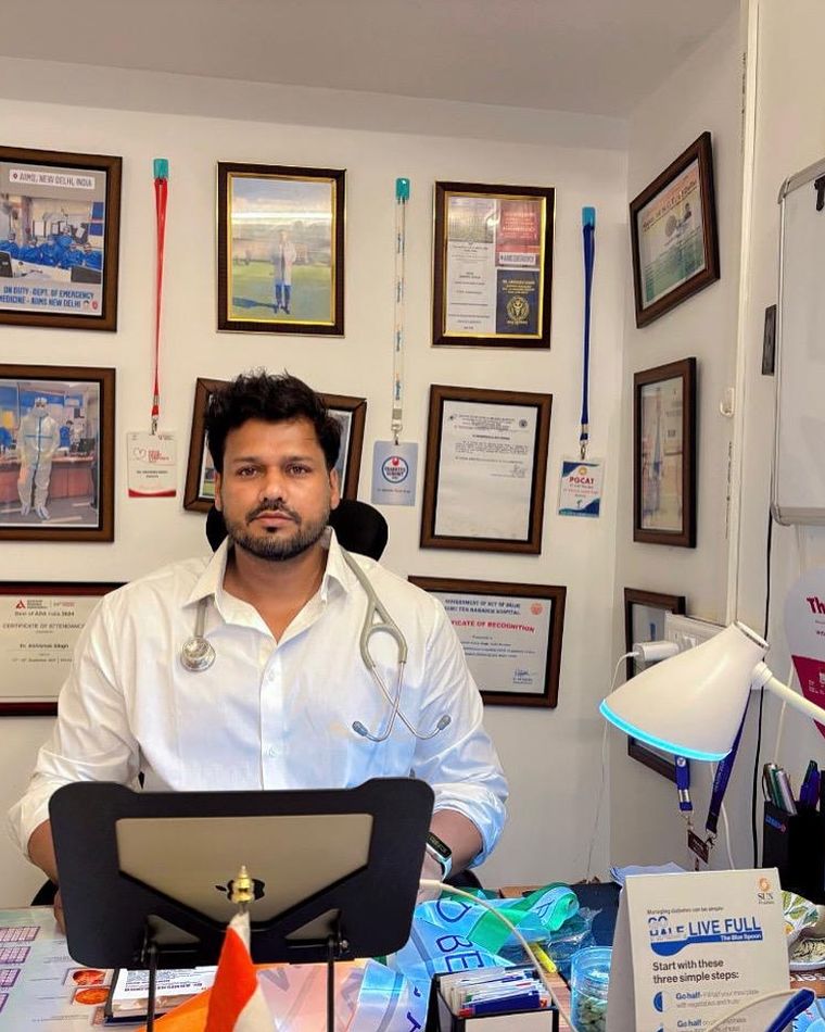 Dr. Abhishek Singh, MD MBBS — heart and diabetes specialist, at his consultation desk in Jeevan Rakshak Hospital, Saharsa